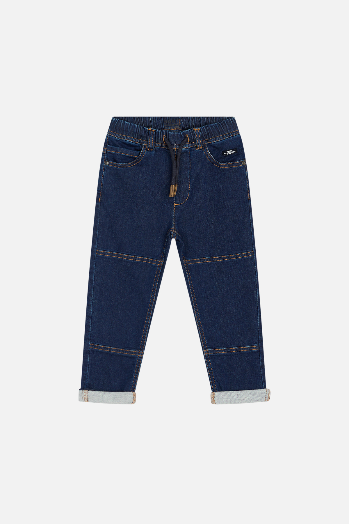 Forfra, mørkeblå jeans for barn i denim med elastisk snøring i midjen og oppbrettede benkanter.