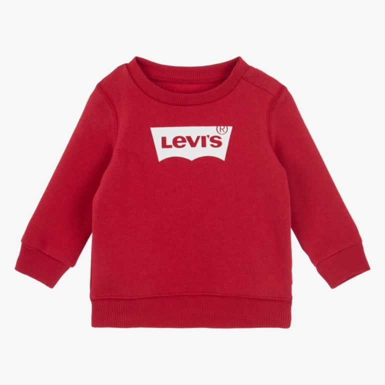 Rød babygenser med hvitt vingformet logotrykk på brystet, sett forfra.