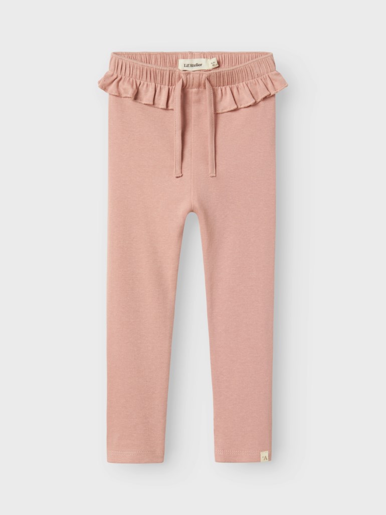 Rosa barneleggings med volangdetaljer i midjen, dekorativ snøring og et lite 'A'-merke på høyre ben.