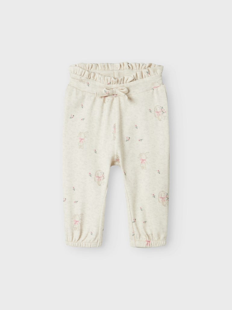 Baby beige melert bukse med rysjekant, dekorativ sløyfe, elastiske mansjetter og rosa kanintrykk.
