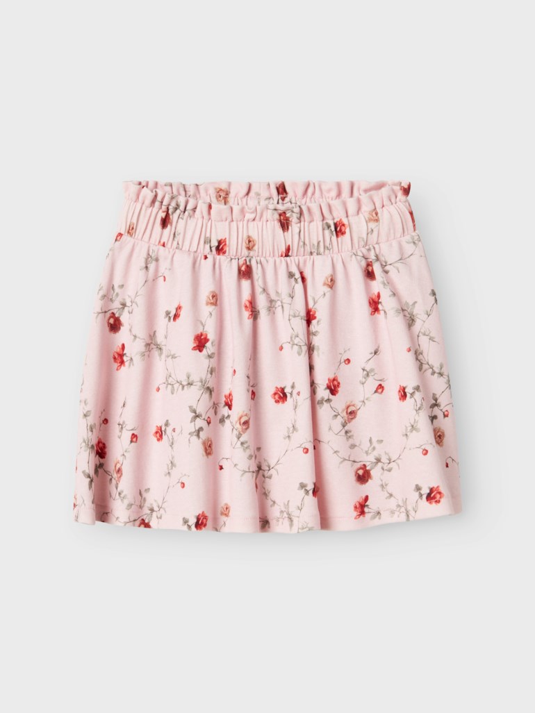 Barnas lys rosa blomstret skjørt med røde roser og en elastisk rynket midje.