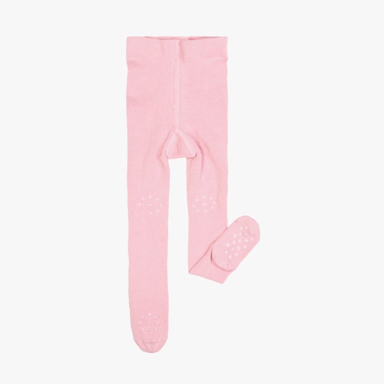 Rosa ribbete babystrømpebukse med antiskli-prikker på knær og såler, flatlagt.