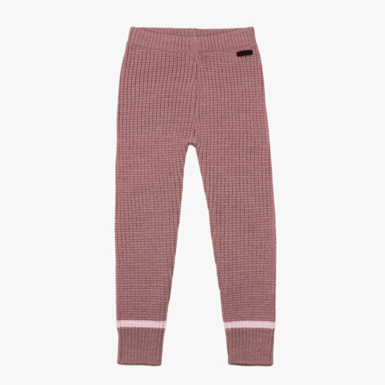 Støvrosa strikkede leggings med lyserosa stripete mansjetter og svart etikett i midjen.