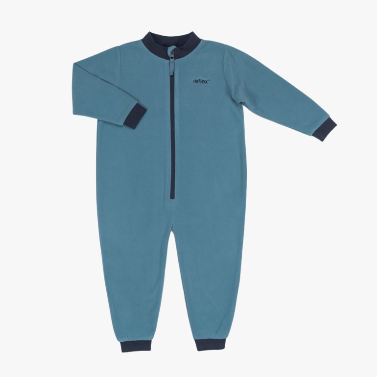 Barns turkisblå heldress med lange ermer, mørkeblå detaljer og glidelåslukking foran.