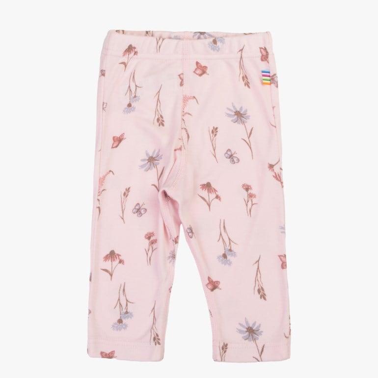 Rosa baby leggings med fargerikt blomster- og sommerfuglmønster, forfra.