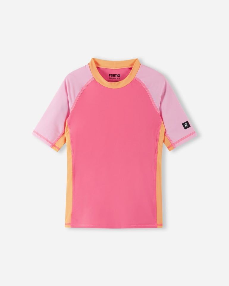 Barns rosa UV-trøye med lyserosa raglanermer og oransje sidepaneler, forfra.