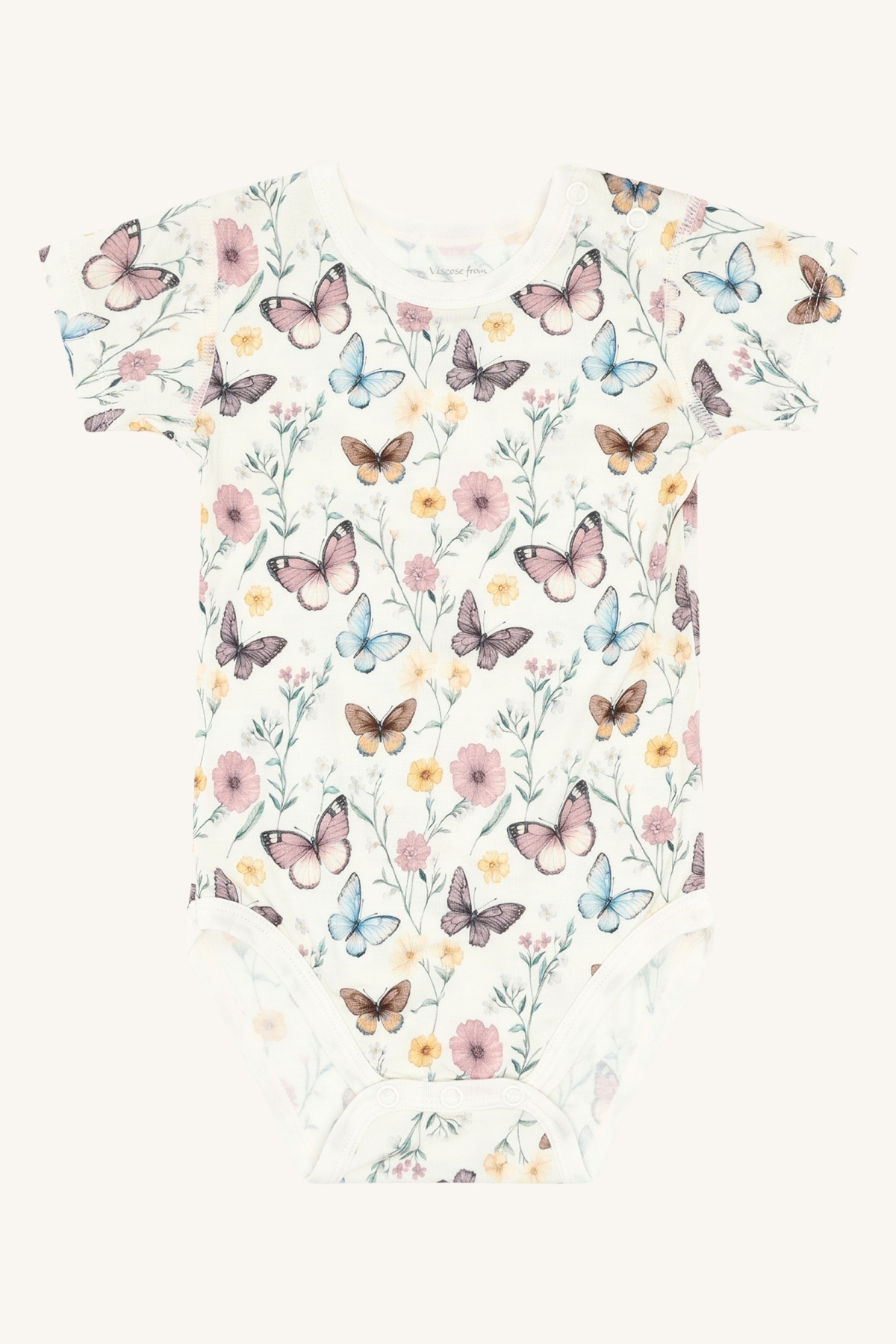Babyens kortermede hvite body med fargerikt rosa, blått, brunt sommerfugl- og blomstermønster, forfra.