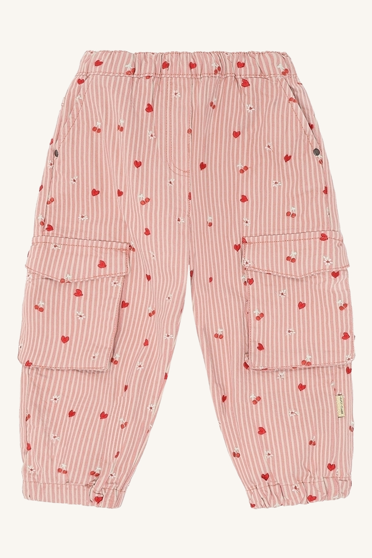 Barnes cargo-bukse i rosa og hvitstripet med røde hjerter, hvite blomster, elastisk midje og mansjetter.