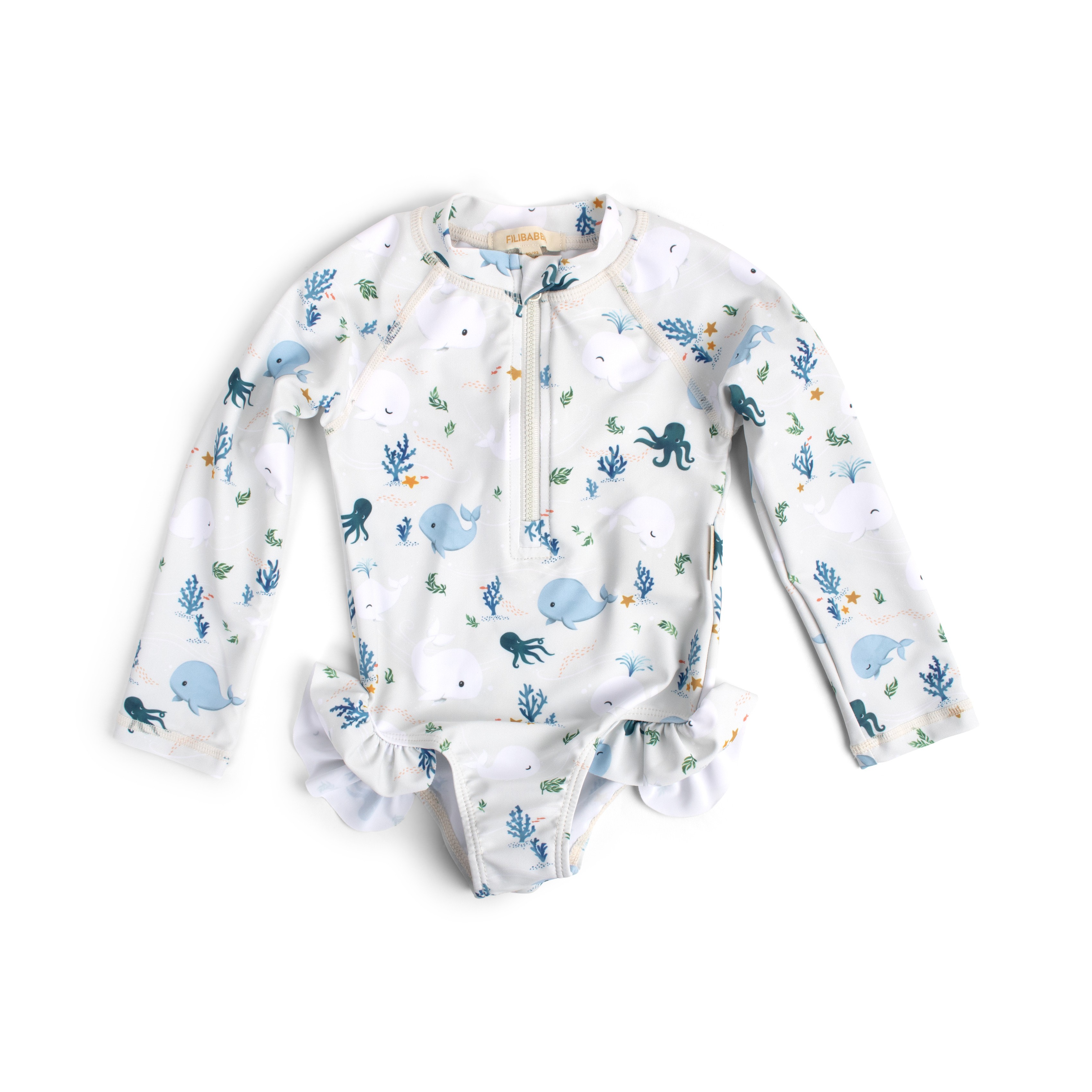 Baby langermet UV-drakt med hvitt, blått hval- og blekkspruttrykk, halv glidelås og volang ved bena.