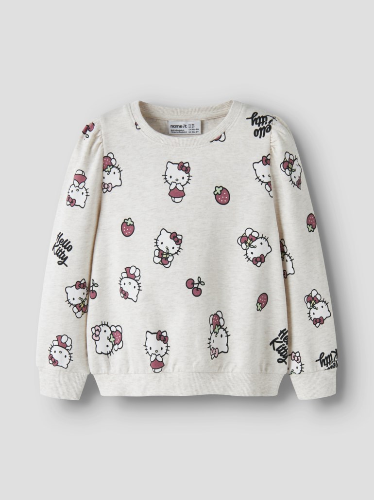 En lys gråmelert barnegenser med lange ermer og heldekkende mønster av Hello Kitty, jordbær og kirsebær.