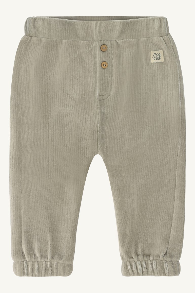 Forfra: babybukse i lys beige kordfløyel med strikk i midjen, to knapper og elastiske benkanter.