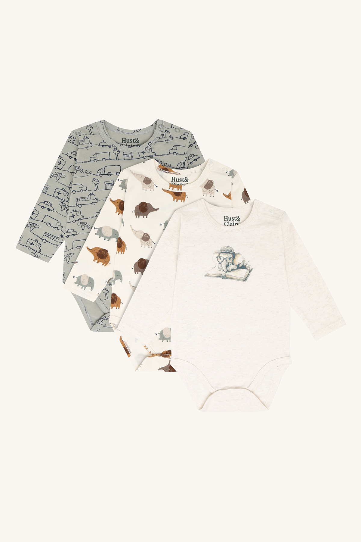Tre baby langermede bodysuits: hvit med lesende elefant, kremfarget med elefanter, grå med kjøretøy.