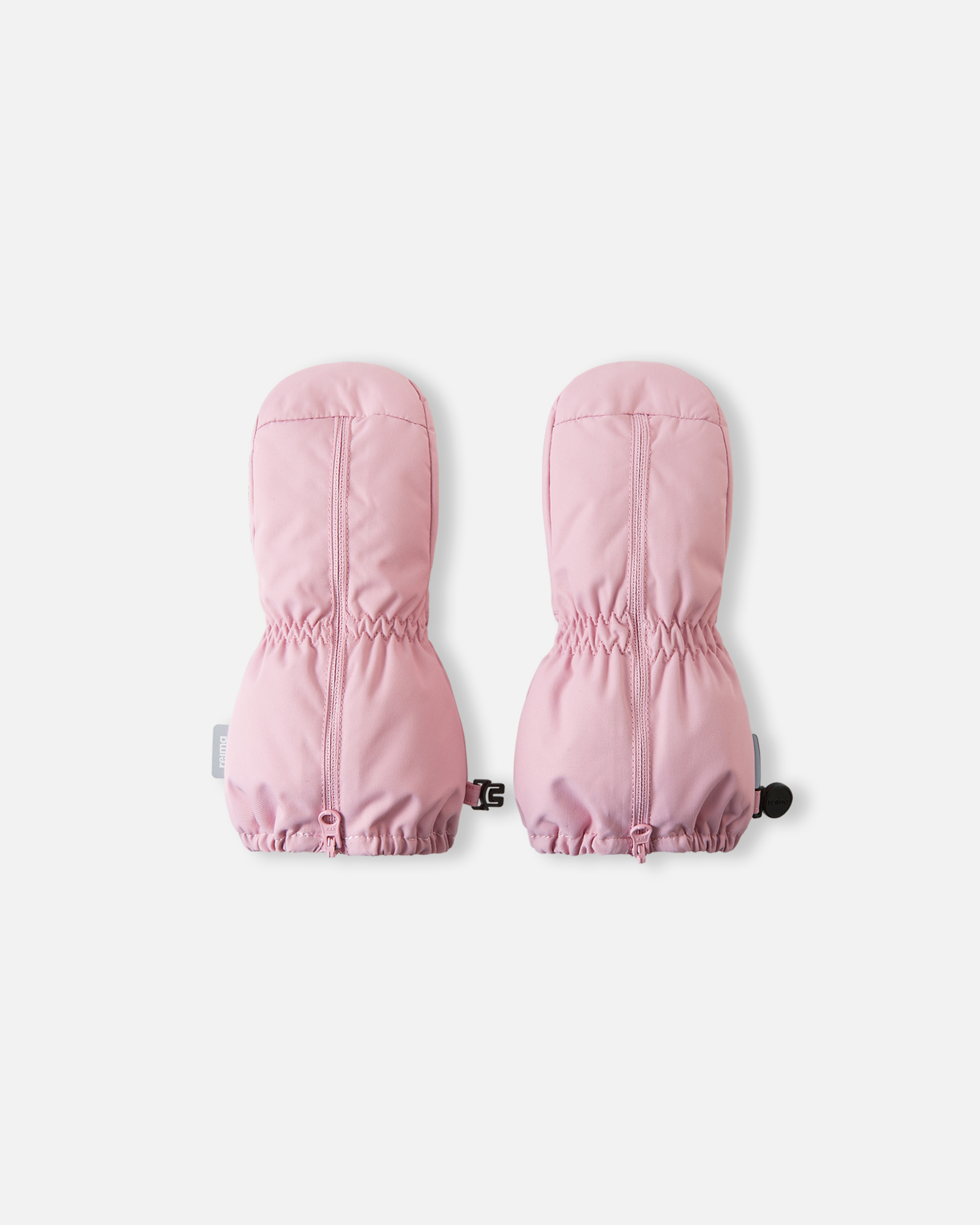 Par rosa polstrede barnevotter med elastiske mansjetter og glidelåser foran, flat lay.