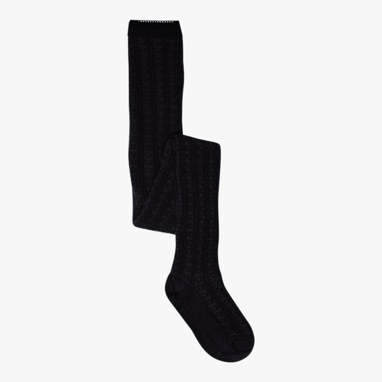 Svarte kabelstrikkede strømpebukser med elastisk linning og fotpartier, brettet.