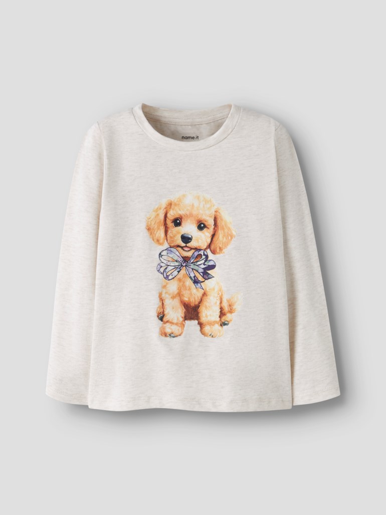 Barns beige melange langermet t-skjorte med trykk av en brun valp som har en sløyfe foran.