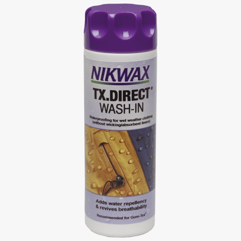 Hvit Nikwax TX.Direct Wash-In flaske med lilla kork, viser en gul vanntett jakkegrafikk.