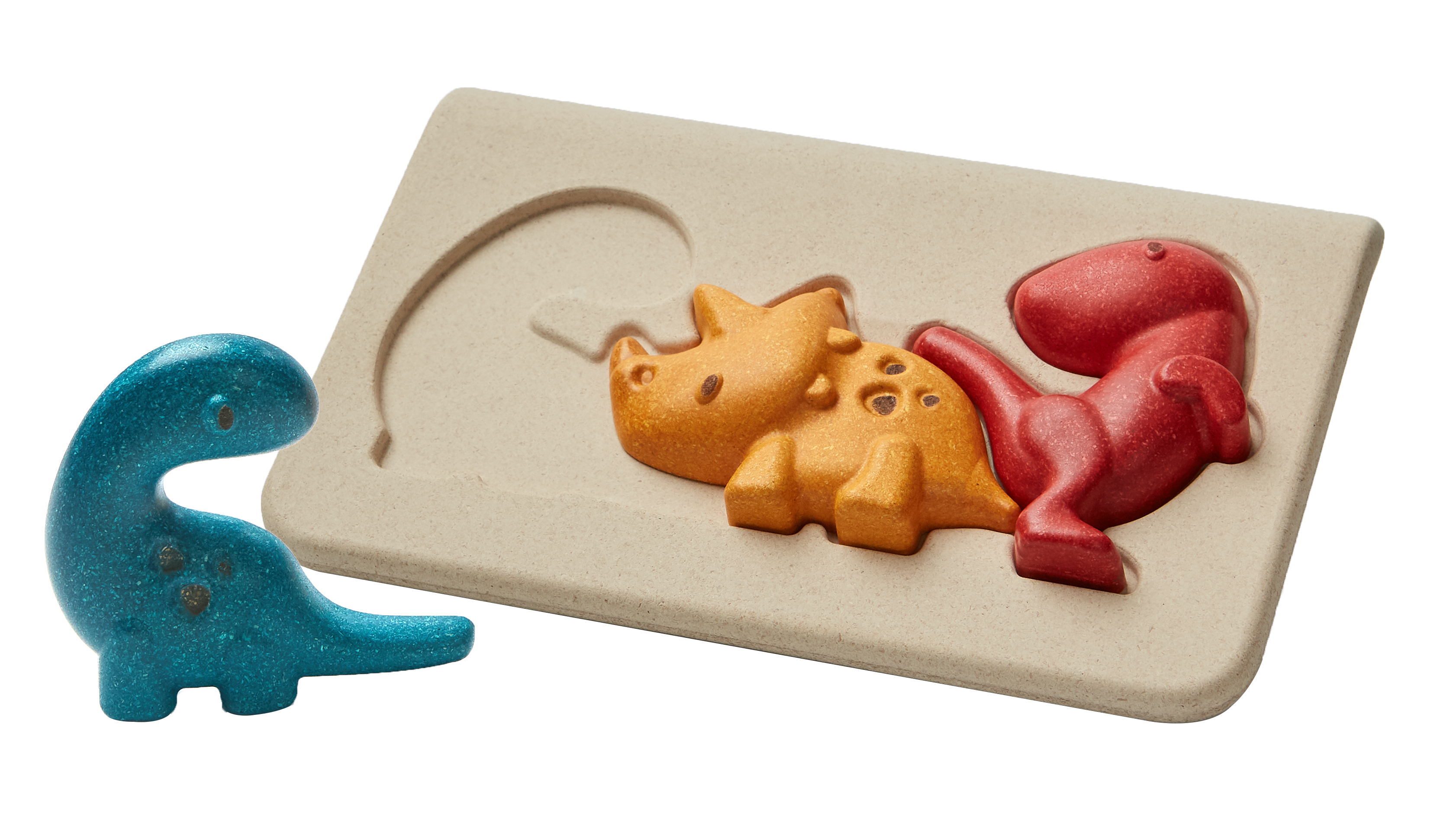 Et lys brunt dinosaurpuslespillbrett med røde og oransje dinosaurbiter, pluss en blå dinosaurleke.