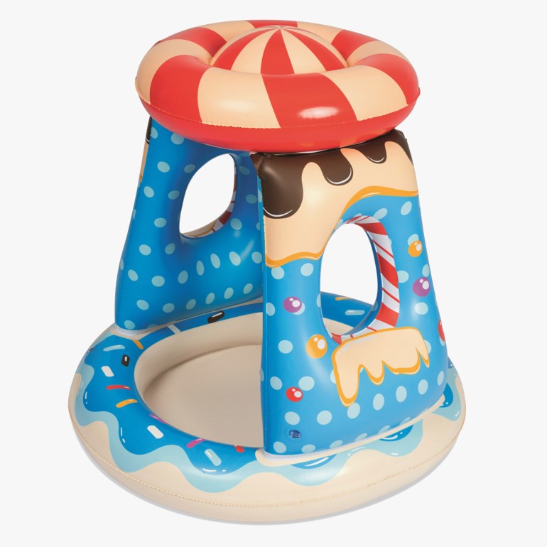Blå prikkete oppblåsbar babyaktivitetssenter med rød stripete topp, godismotiv og smultringbunn.