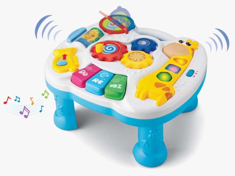 Hvitt og blått plast babyaktivitetsbord med sjiraff, pianotangenter, roterende gir og lydeffekter.