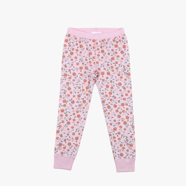 Barns lysrosa leggings med blomstermønster, oransje blomster og grønne blader, ribbestrikkede mansjetter og midje, forfra.