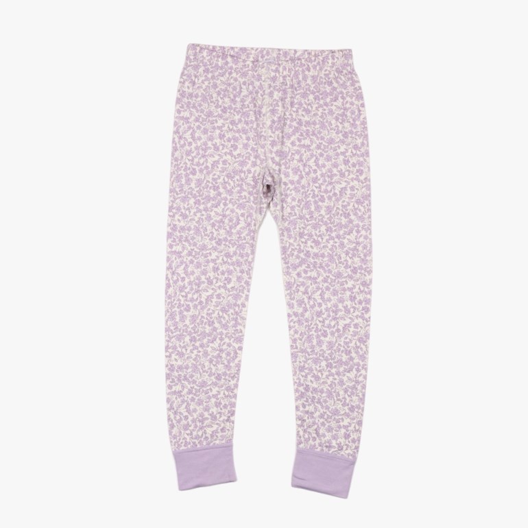 Barns lavendel og kremfargede blomstrete leggings med strikk i livet og mansjetter ved anklene, flatt, sett forfra.