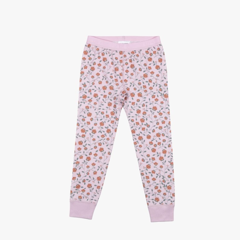 Barns lysrosa leggings med blomstermønster, oransje blomster og grønne blader, ribbestrikkede mansjetter og midje, forfra.